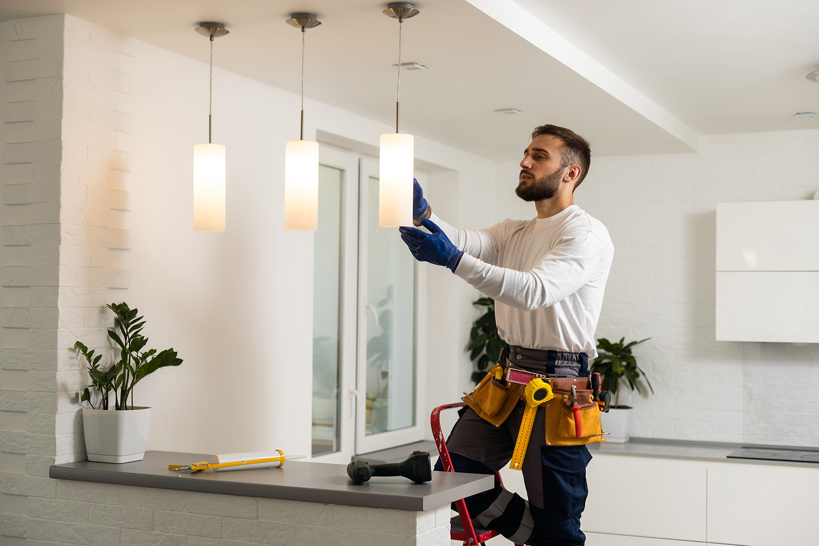 Electrician performing residential wiring installation